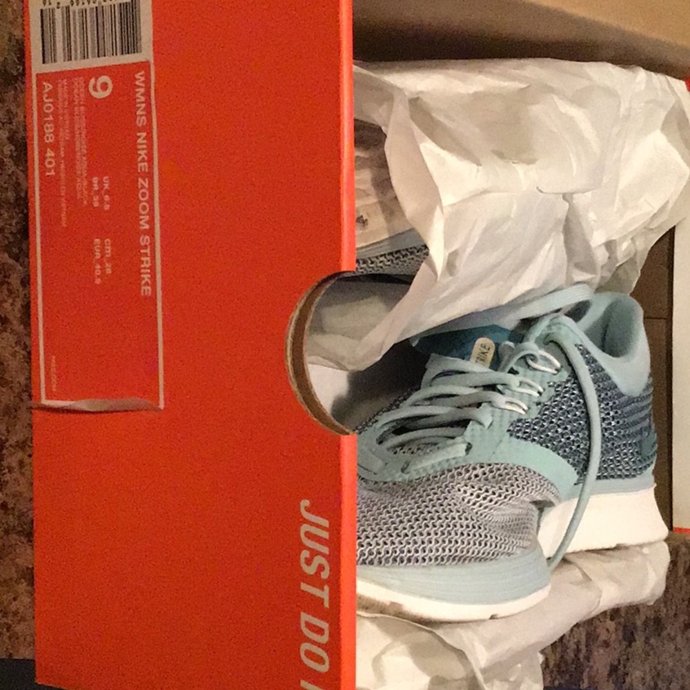 Women’s Nike Zoom Strike tennis shoes.